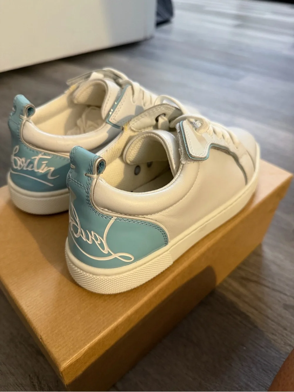 Christian Louboutin White Sneakers with Light Blue Heel Accent